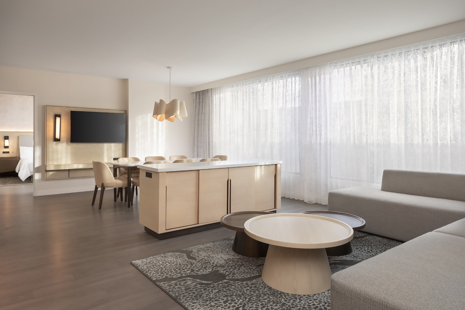 APF_Hospitality-Suite-Living-toward-Bedroom